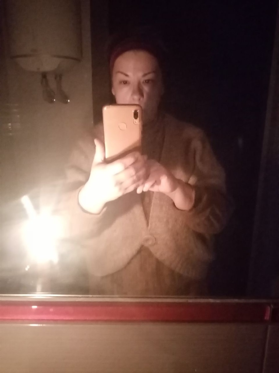 Halyna in a house with cut off electricity