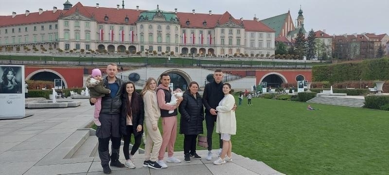 Family in Poland - Nadija with Kyrylo in the middle with two-months-old Emily 
