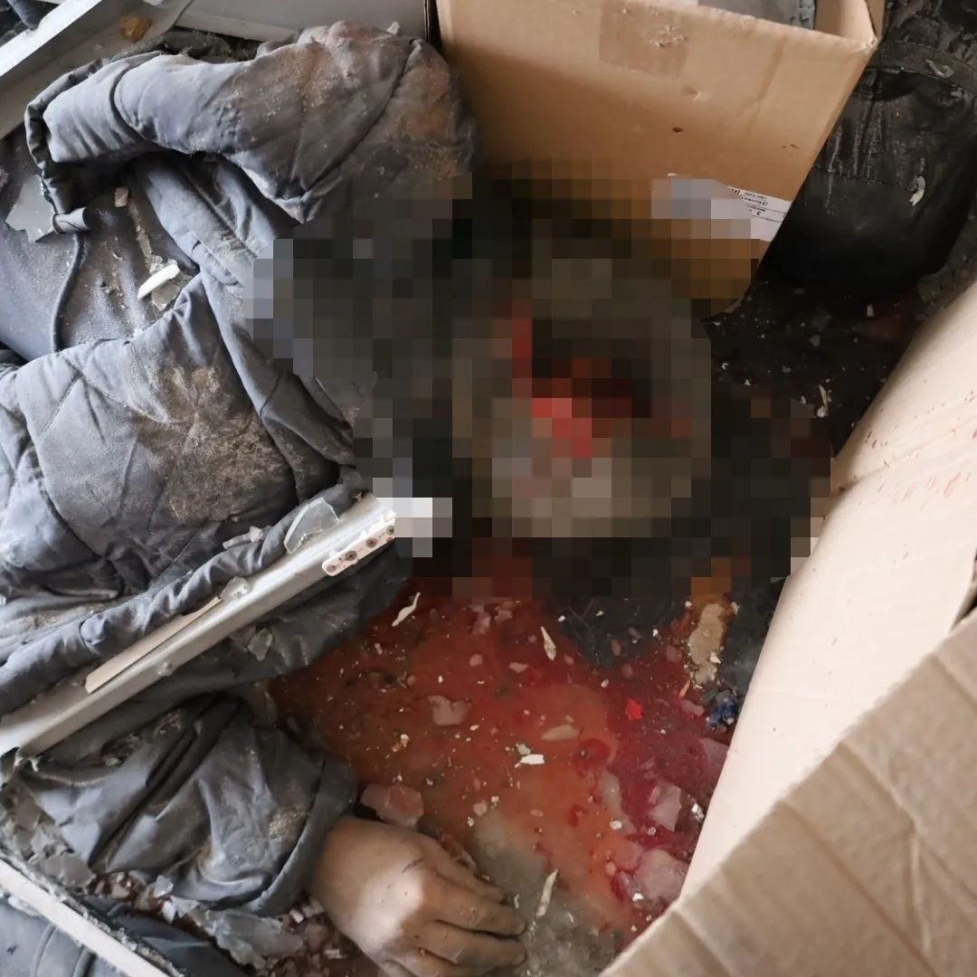 The dead body of Valeriy killed as a result of Russian shelling