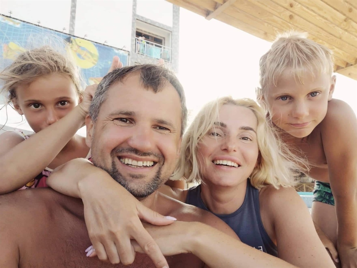 The Bezuhliy family: Oleksandr, Kateryna, and their kids. 